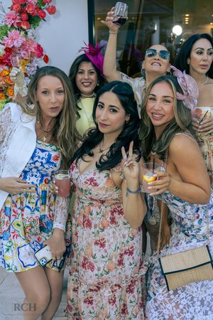 Group portrait captured during a Bay Area luxury lifestyle event by Raymond C. Hansell Photography.