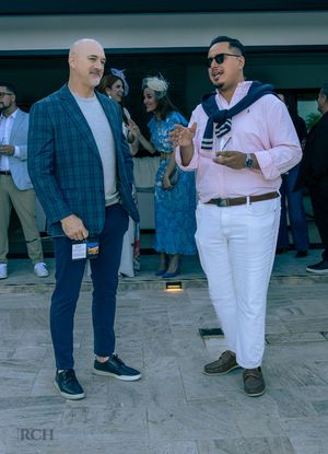Guests networking during a luxury high tea event in Los Gatos photographed by Raymond C. Hansell Photography.