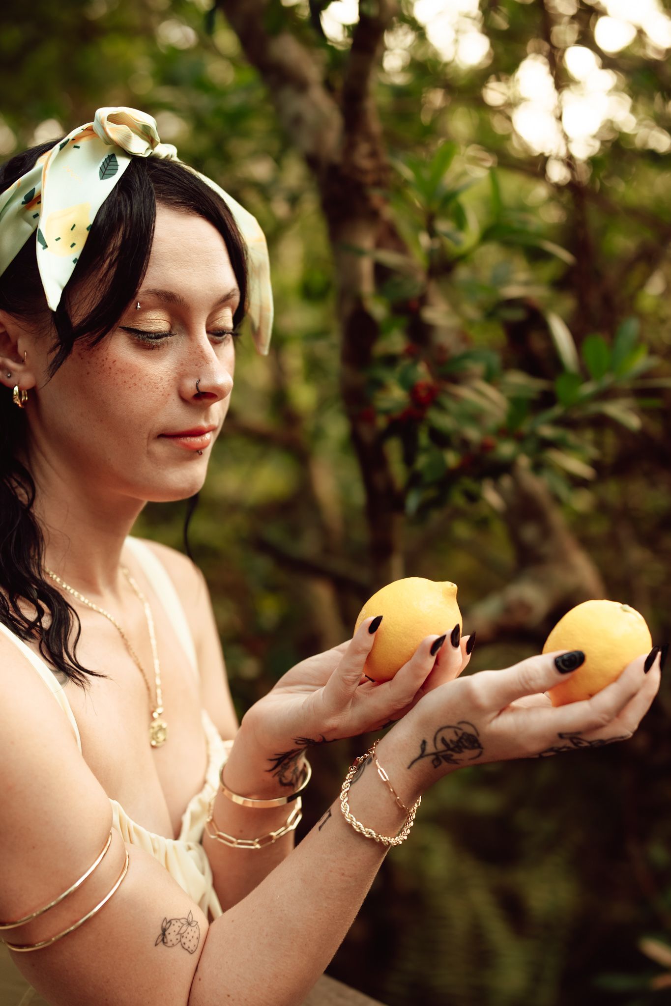 Creative concept session of a woman with lemons at Sawgrass Lake Park in St. Petersburg, FL