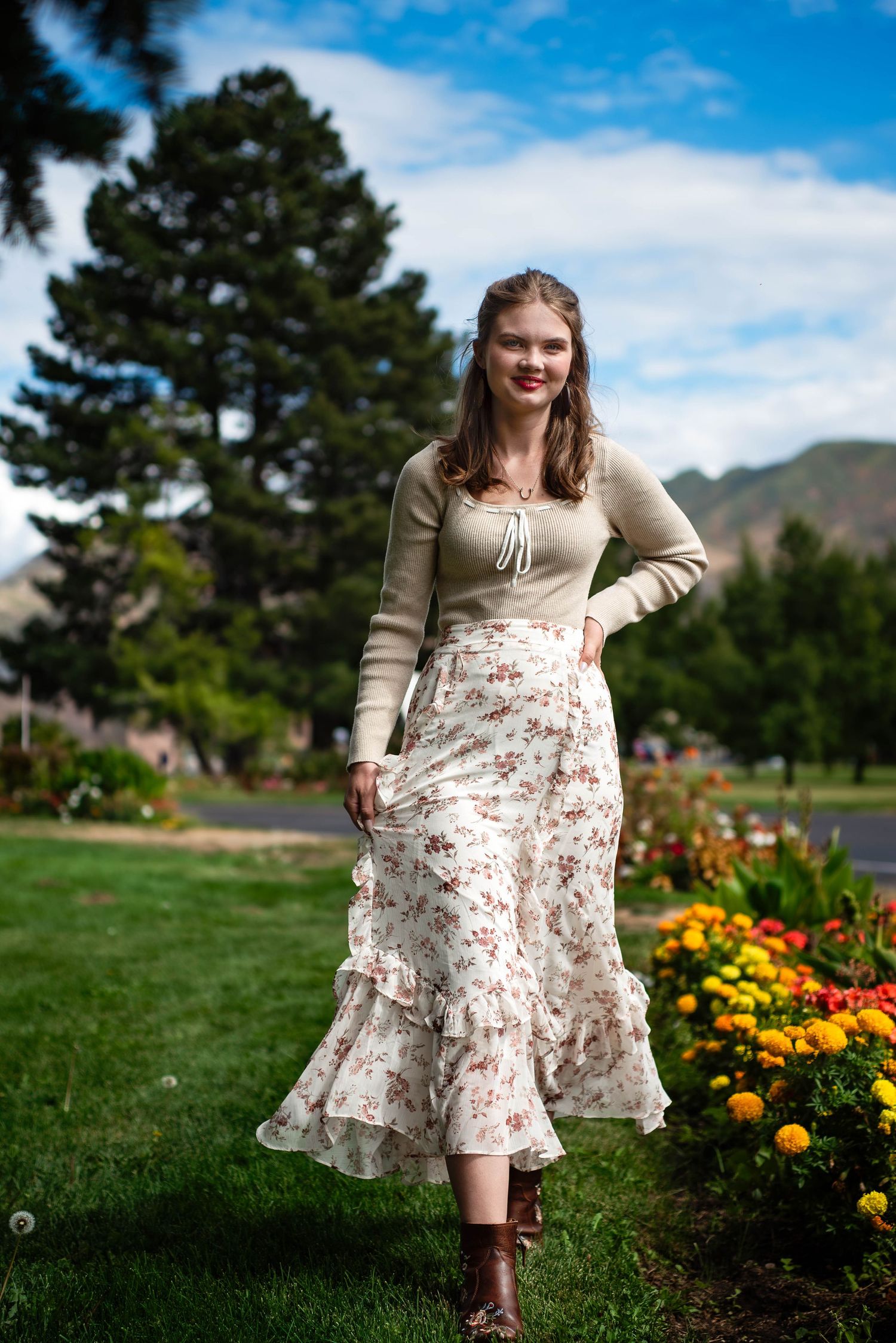 colorful portrait of a girl walking with flowers and trees in the back