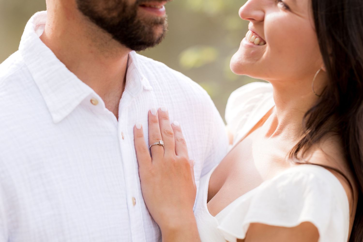 Close-up profile shots of couple during romantic outdoor photo session.