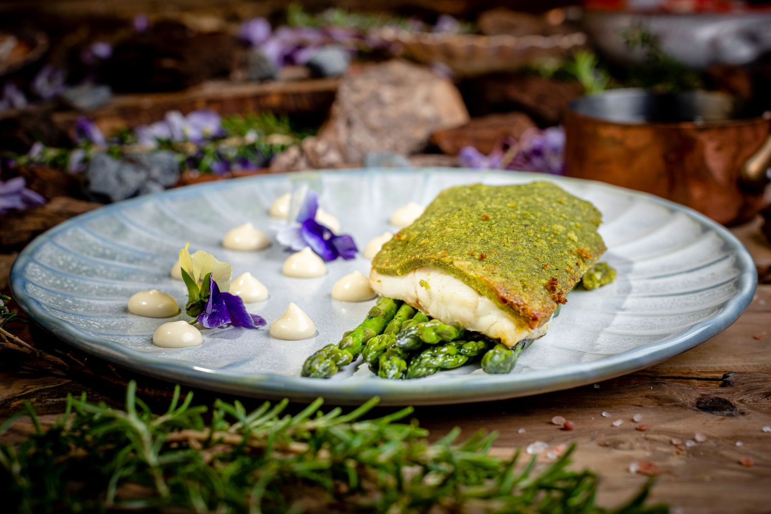 Food photographer capturing cod with pistachio, designed for exclusive restaurants. Photography at Nikki Beach Club, Marbella.