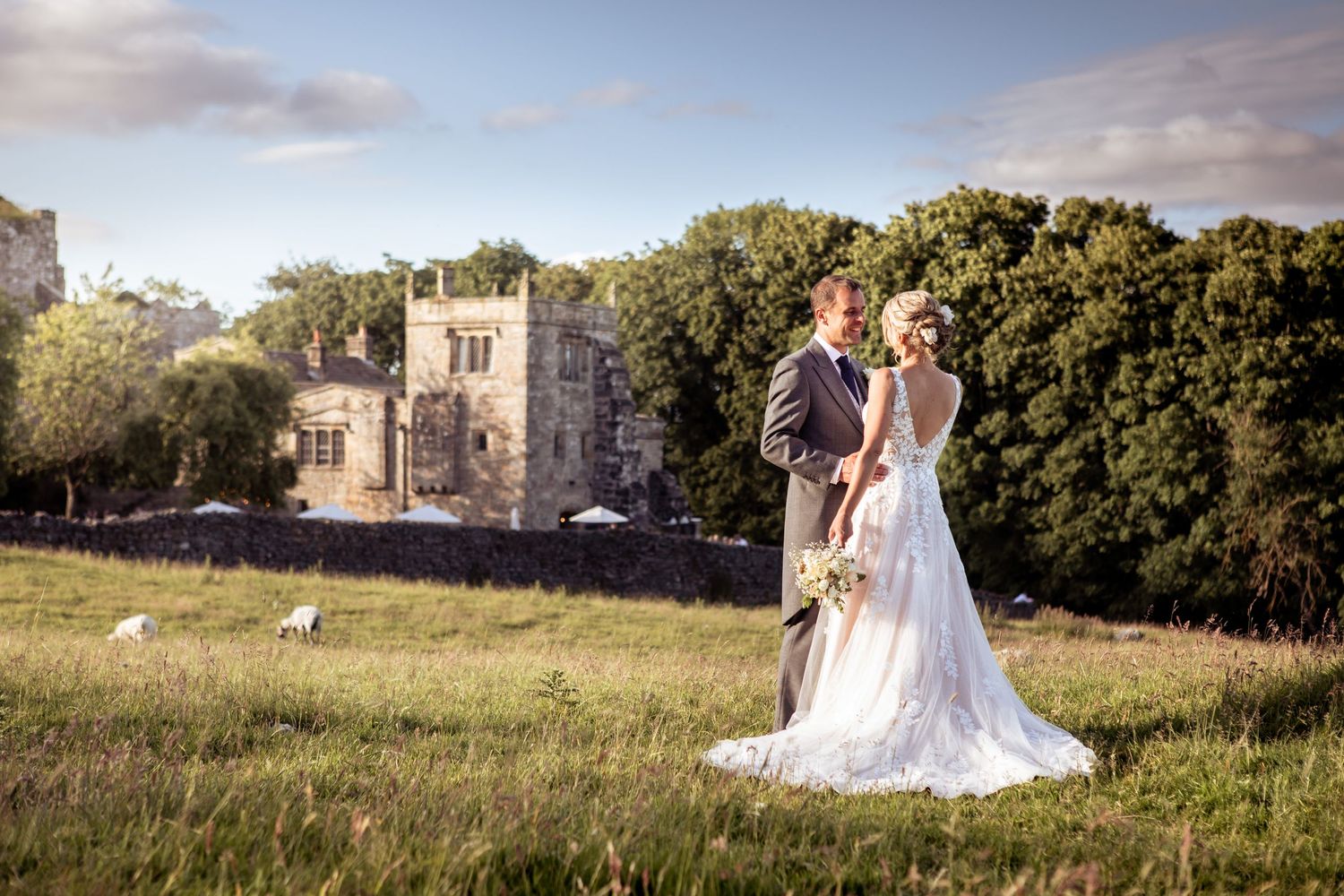 relaxed wedding photography at the priests house classic informal look with countryside and sunset backdrop