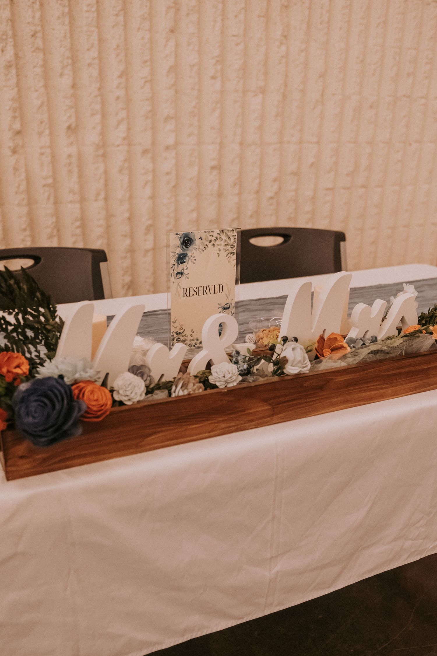 Wedding table decor with blue floral arrangement. Small weddings in New Mexico. Intimate wedding venues. Albuquerque Garden Center weddings.