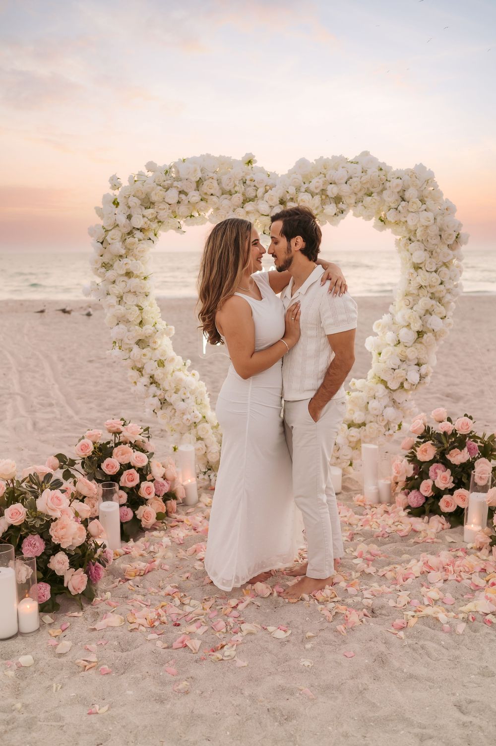 Beach engagement proposal captured during natural light photography session