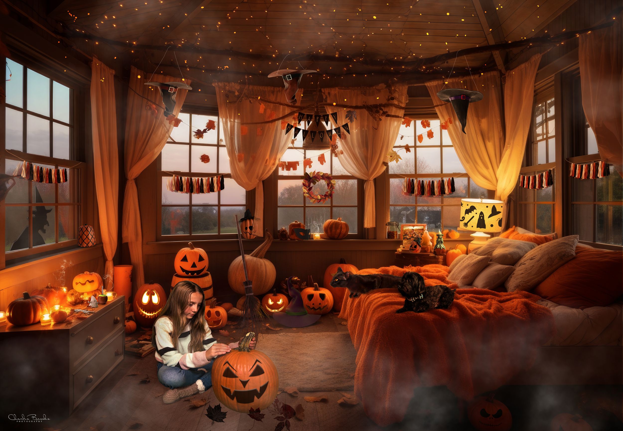 Cozy attic room decorated for Halloween with pumpkins, candles and warm lighting.