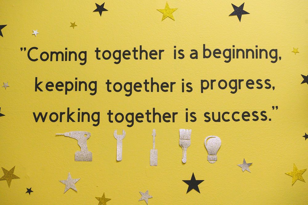 Motivational quote banner on yellow with stars showing coming together is beginning to working together is success.