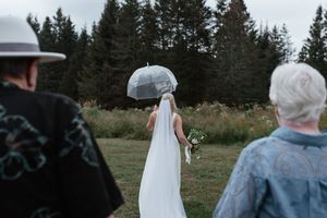 Seven sequential wedding photos displayed in a horizontal filmstrip showing moments during an outdoor ceremony.