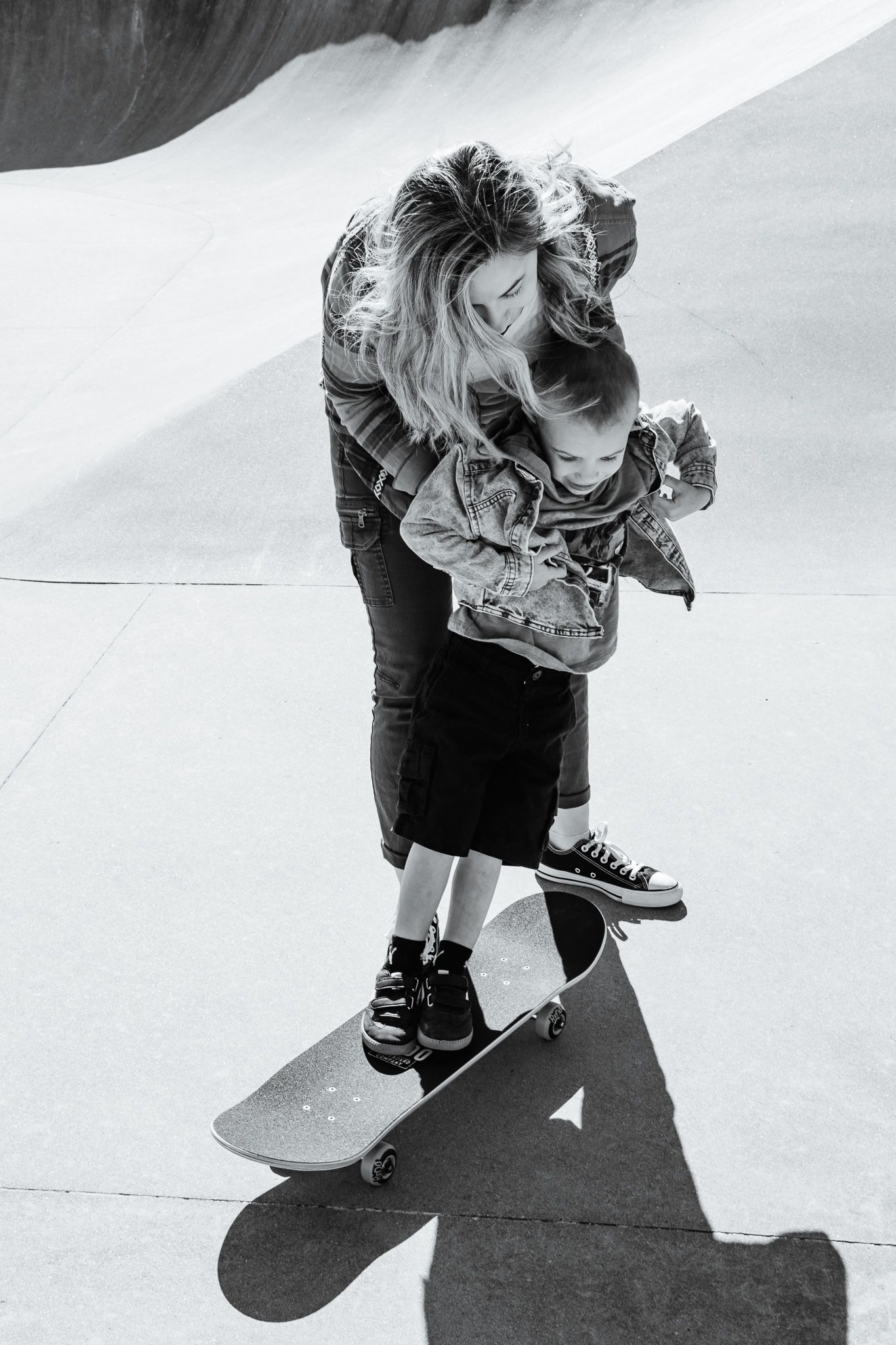Motherhood Adventure Photography Session at a skatepark | Mom helping son learn to skateboard | K Murphy Photos | Roanoke, VA
