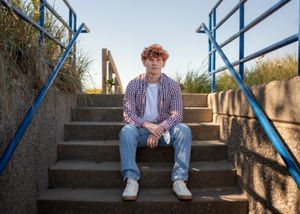Multiple angles of a casual outdoor photoshoot on concrete steps with blue railings.