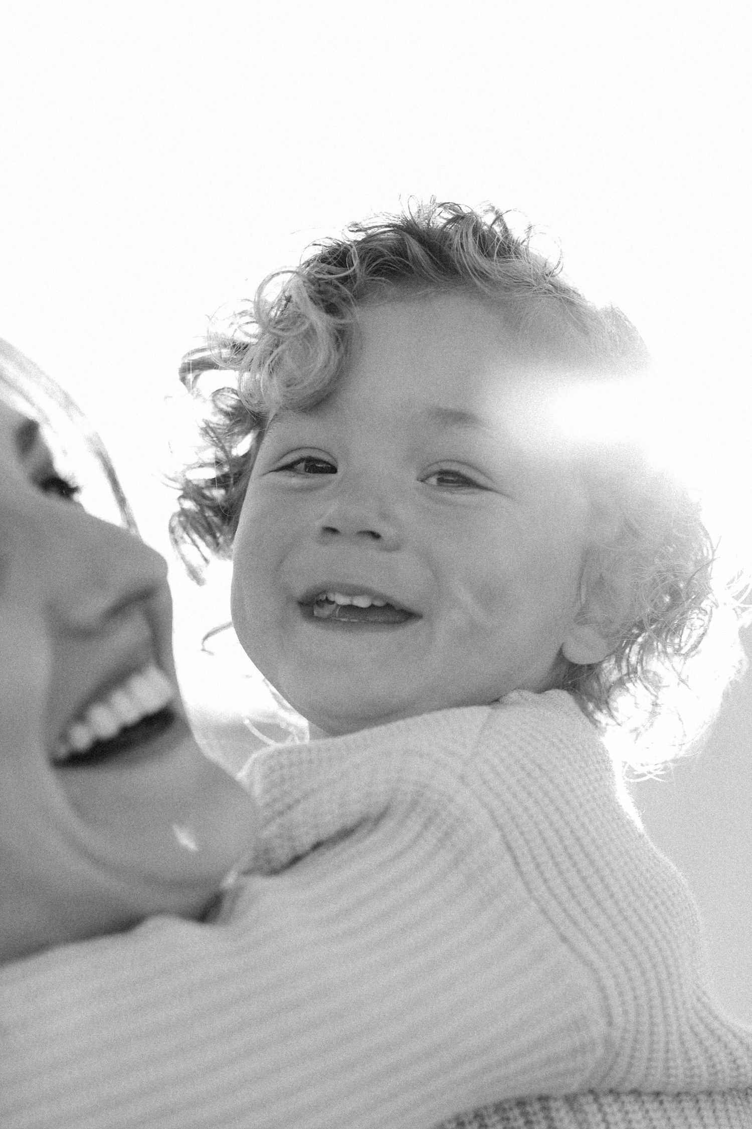 Orange County family photography capturing authentic, playful moments of mom and son