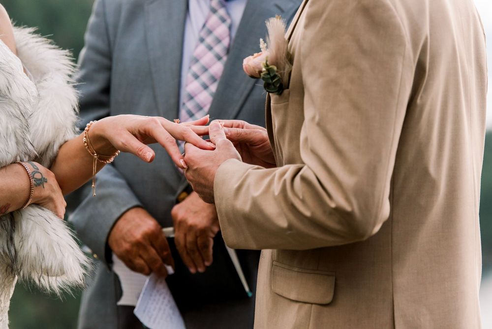 Bride and groom share a romantic first dance together at their wedding reception.