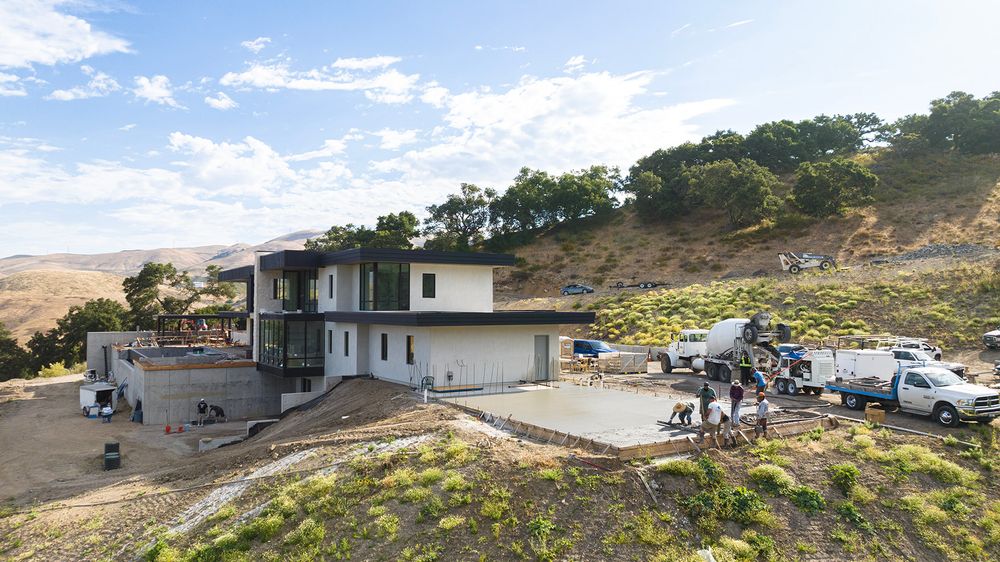 A fancy house with a helicopter pad on the hill in Arroyo Grande.
