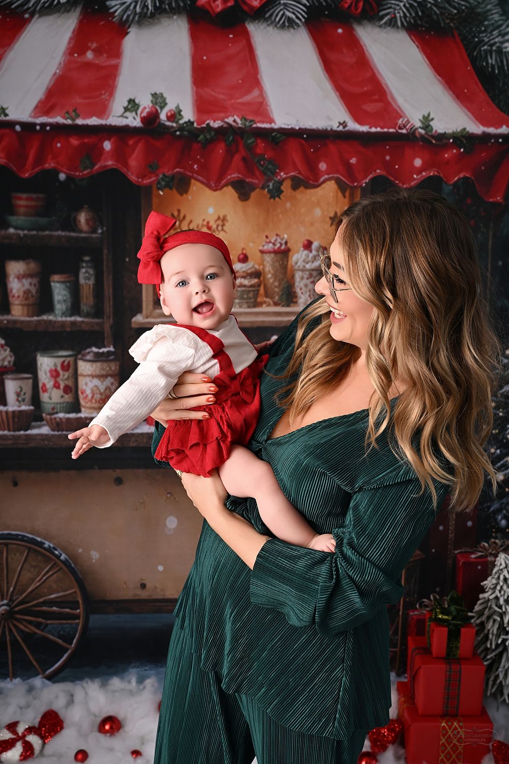 Joyful holiday moments captured in front of a Christmas shop display with vintage decorations.