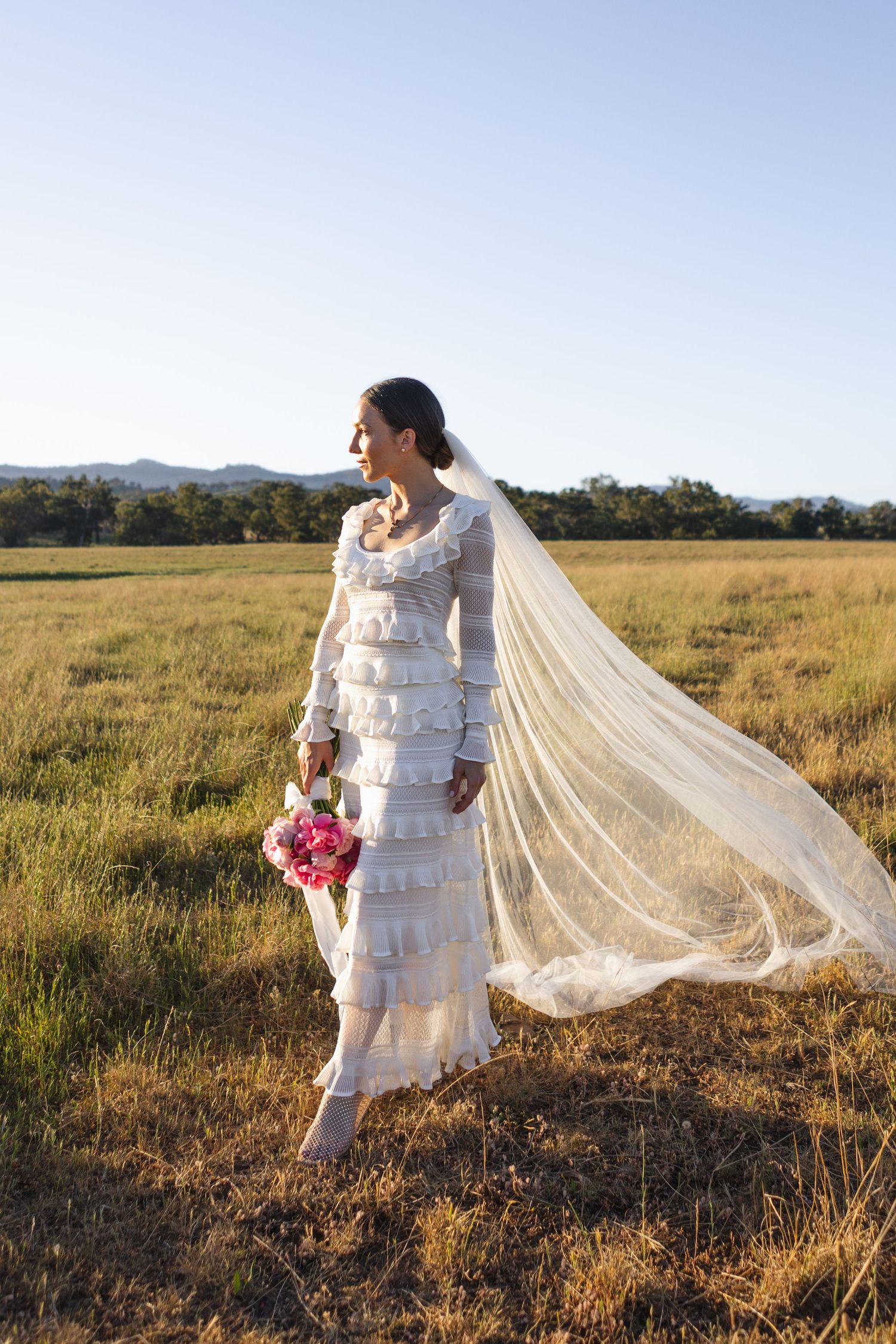 Bride in paddock at Scone NSW Country wedding