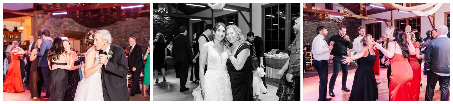 Wedding party dancing and celebrating at reception with dramatic red lighting effects.