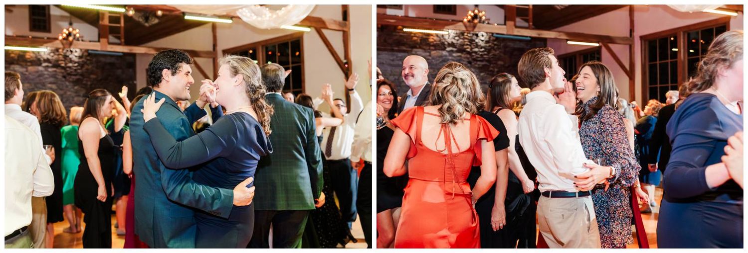 People dancing and socializing at an indoor event with warm lighting and festive atmosphere.