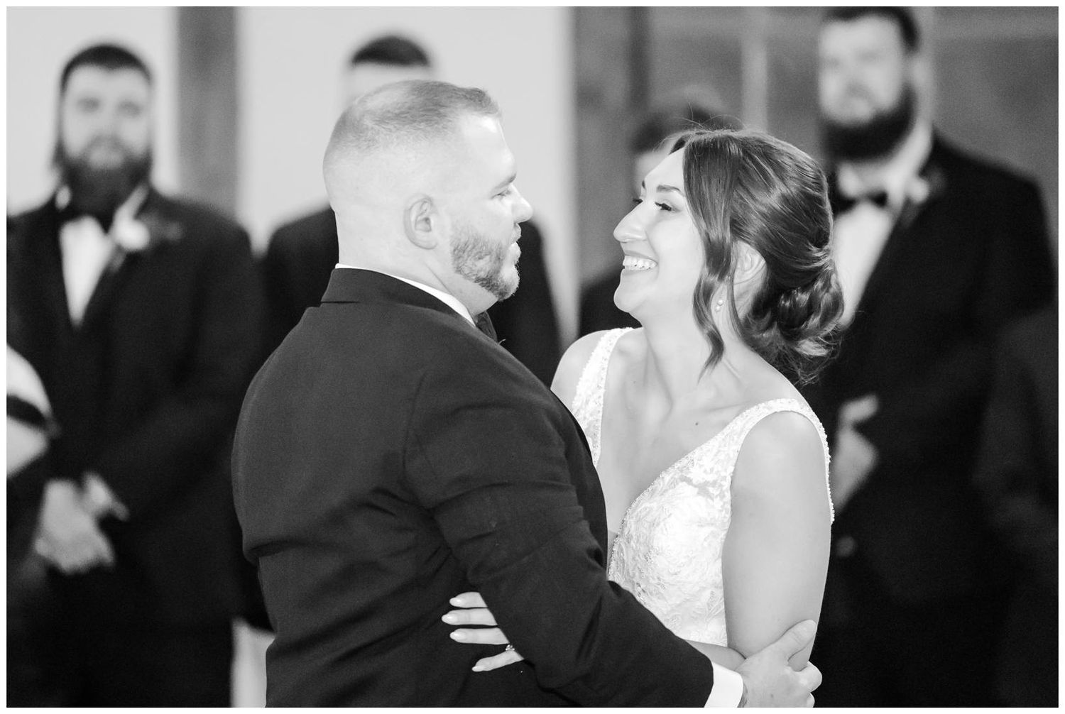 A series of black and white wedding photographs showing couples and guests at a celebration.