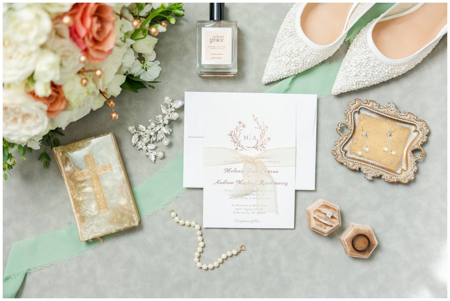 Elegant wedding details including floral arrangements, pearl necklaces, invitations, and vintage-inspired decor in soft pink tones.