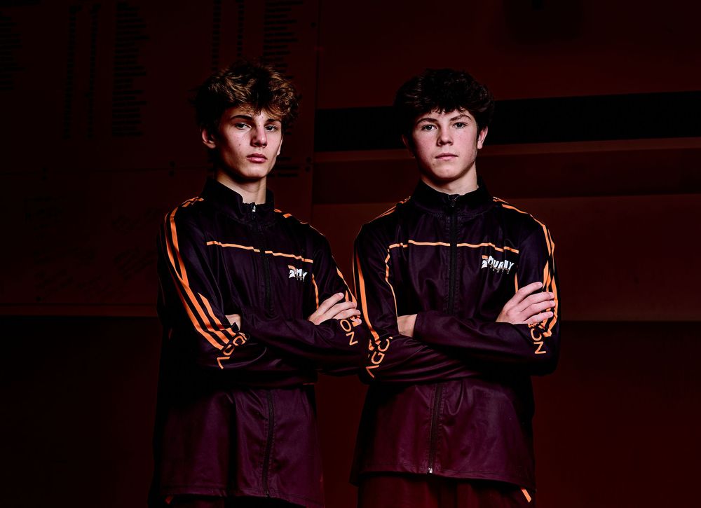 High school wrestler media-day style portrait with dramatic lighting — professional sports photography