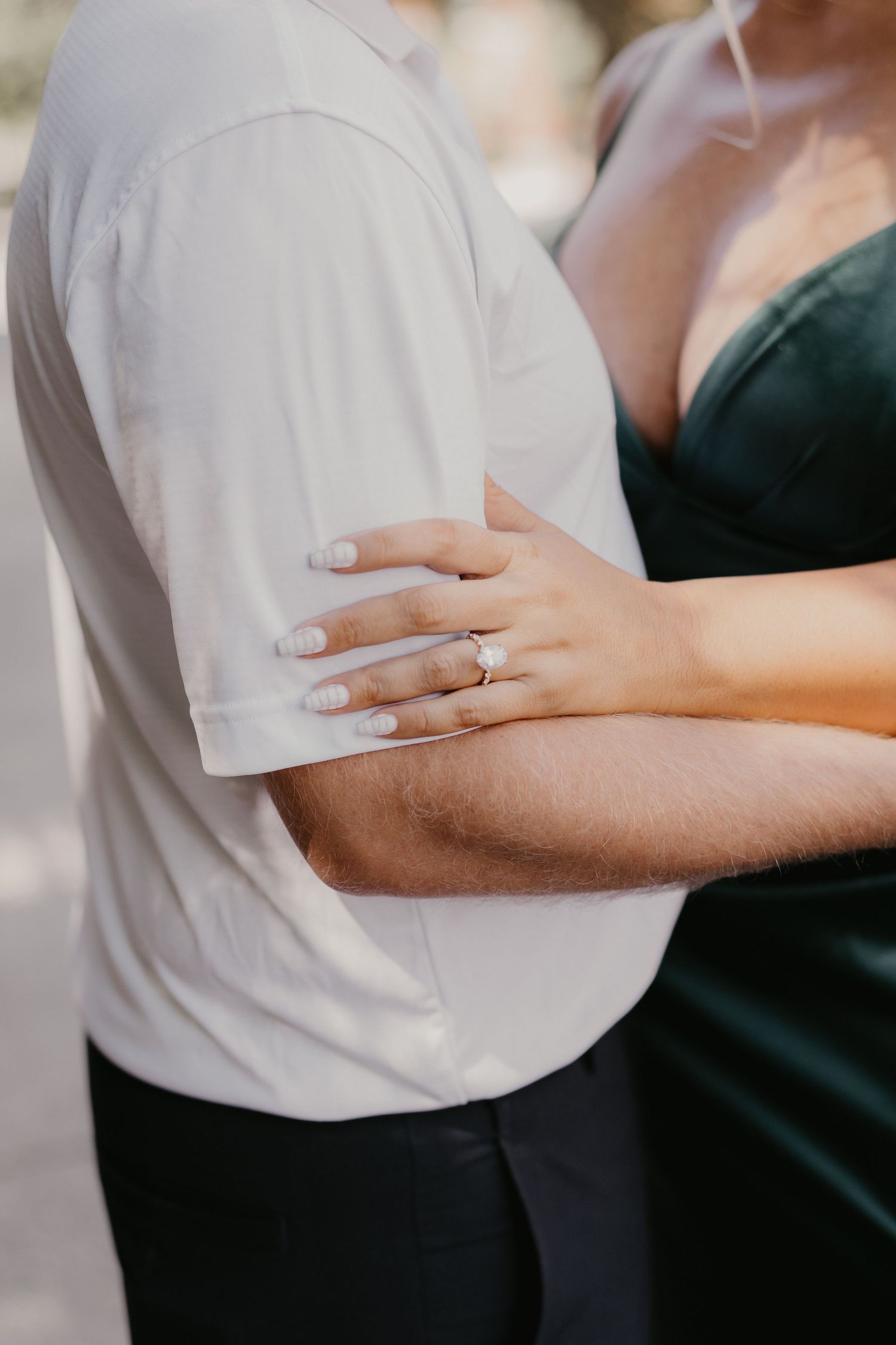 Bride putting on wedding ring, getting ready portrait