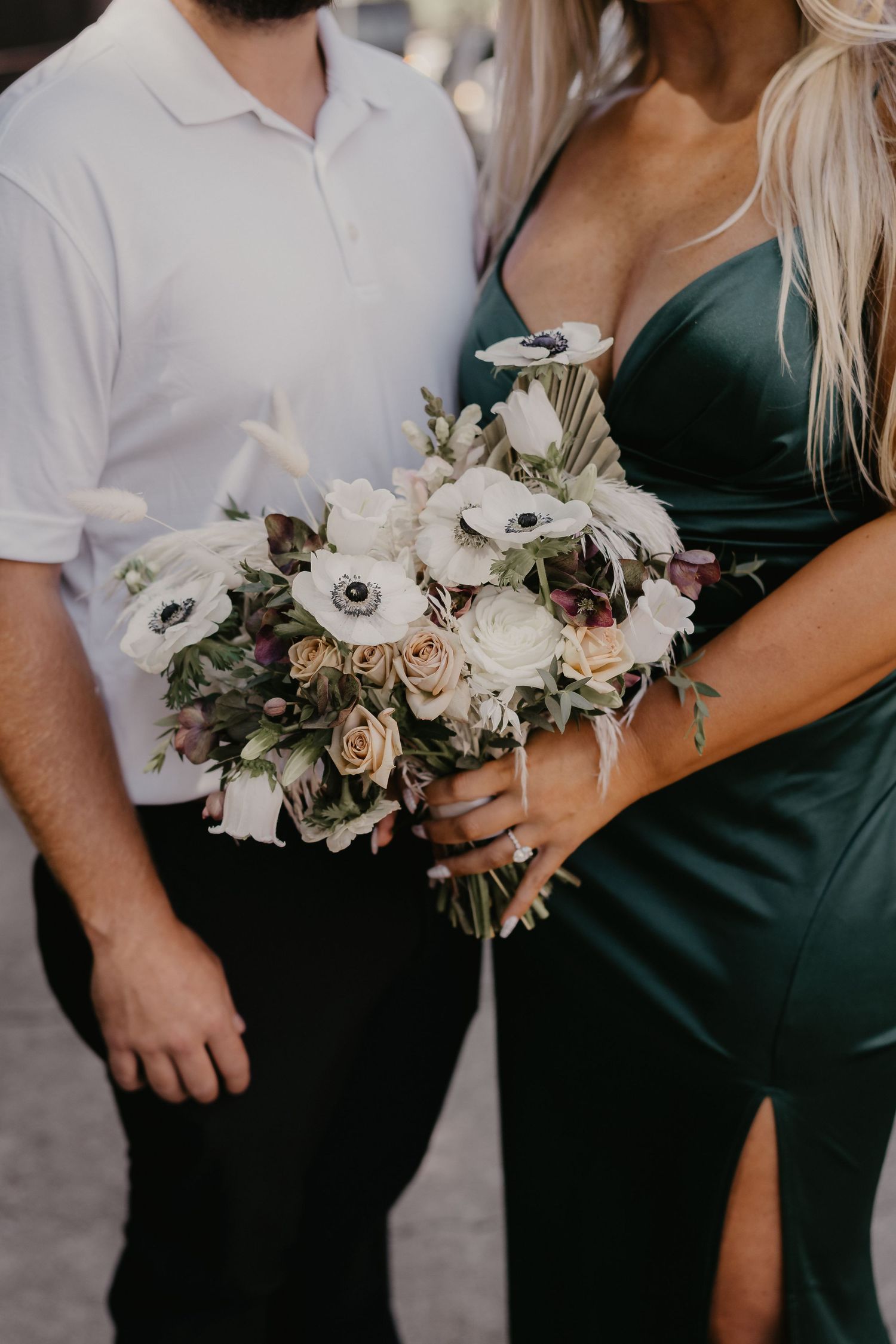 bride holding flowers before courthouse ceremony
