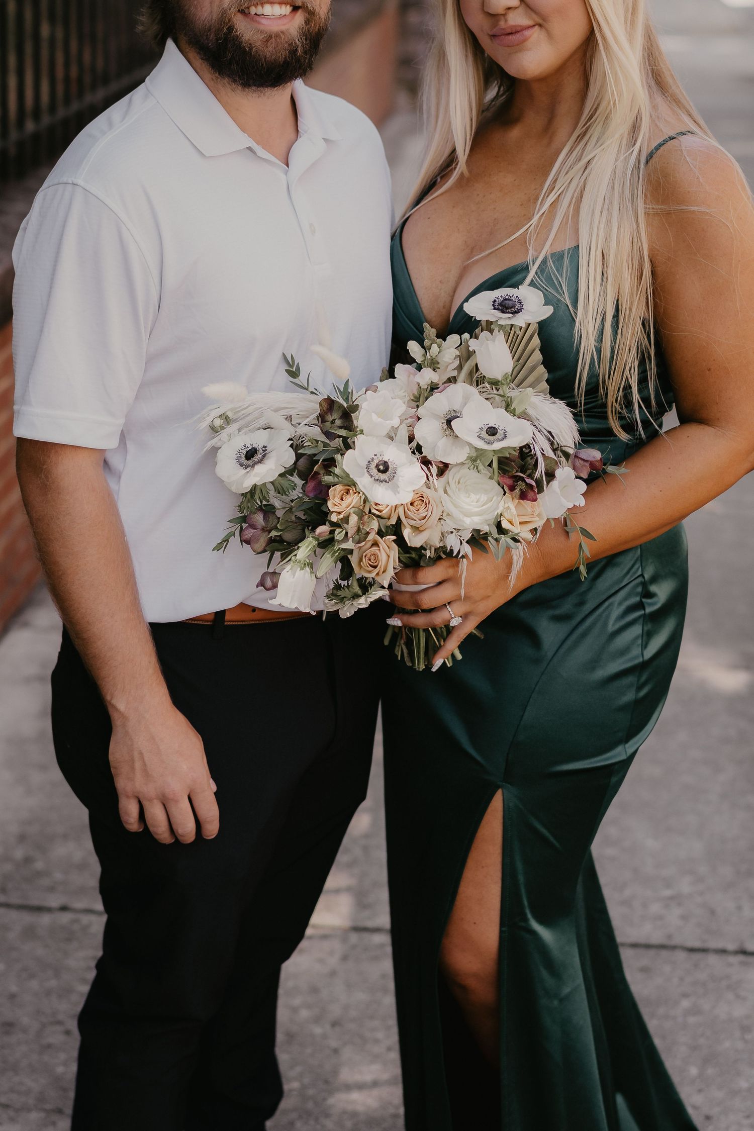 bride & groom holding flowers outside maryville courthouse