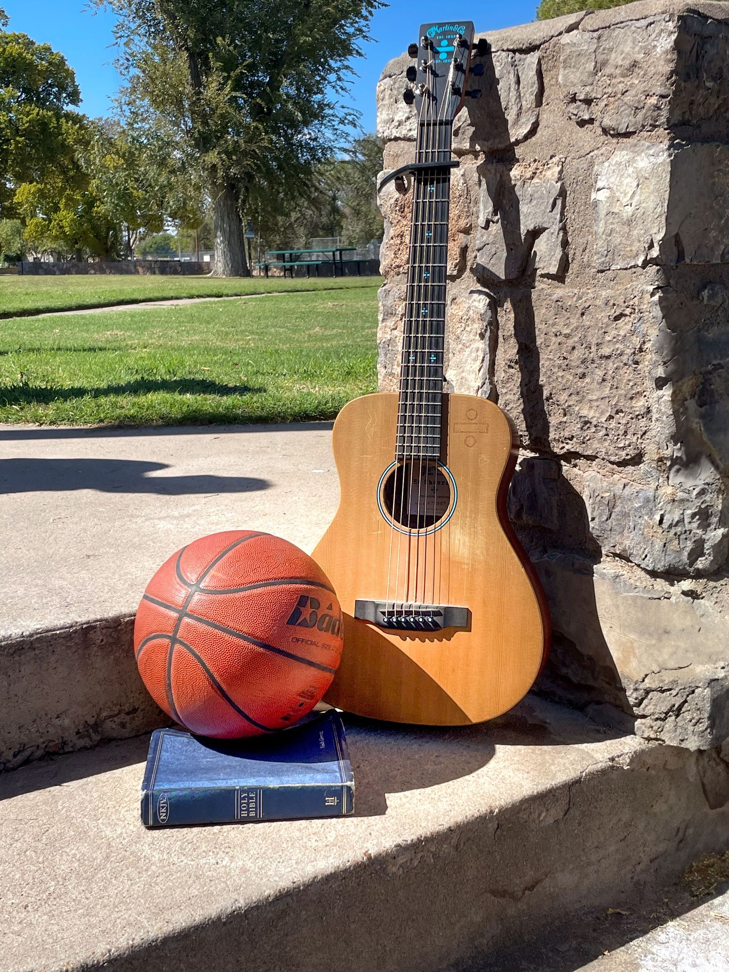 I just love this photo taken from a senior session when I asked him to bring what he loves and he had 3 things God, Music, and Basketball.