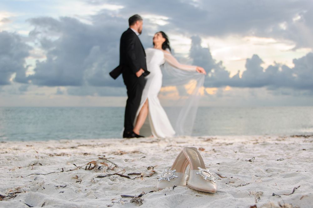 creative wedding photo of couple on beach in New Port Richey