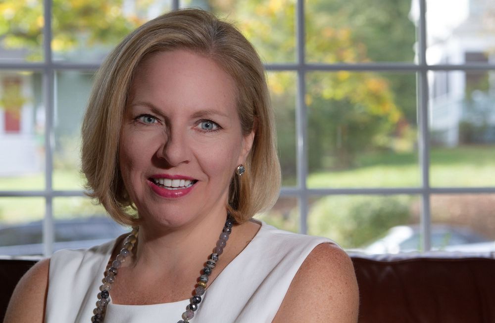 Personal branding photo of a businesswoman in a modern office | Northern NJ headshots