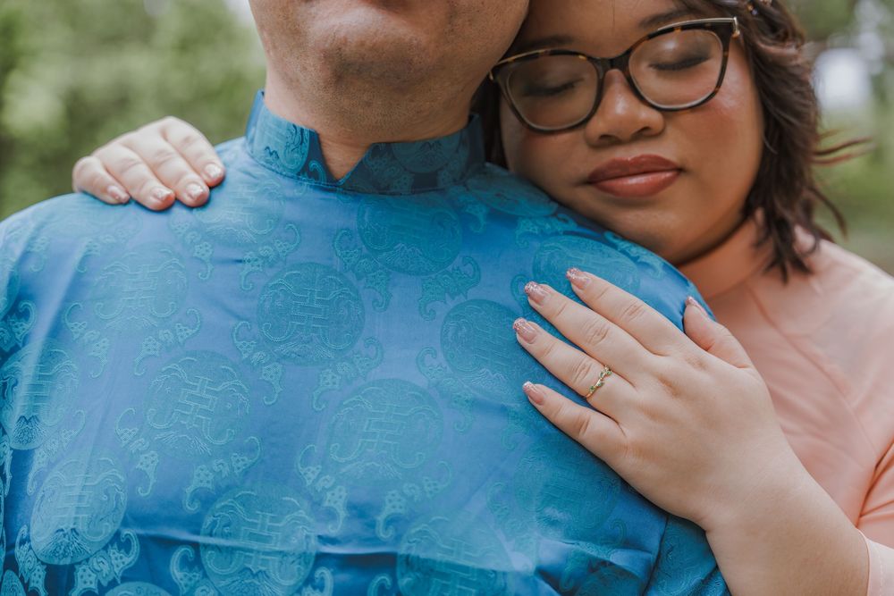 Intimate close-up portraits of couple in casual attire outdoors.