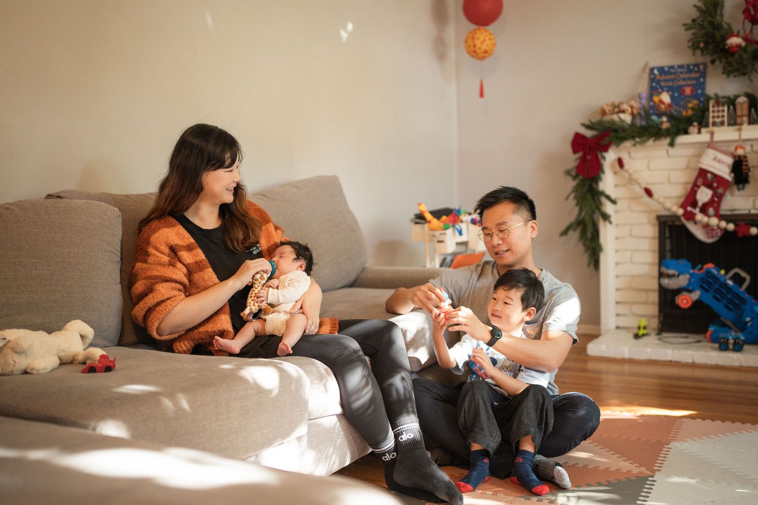 A series of candid family moments showing parents and children relaxing together on a couch at home.