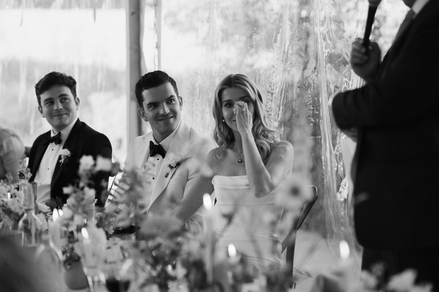 bride wiping tear away at fathers speech at hamswell house wedding in bath
