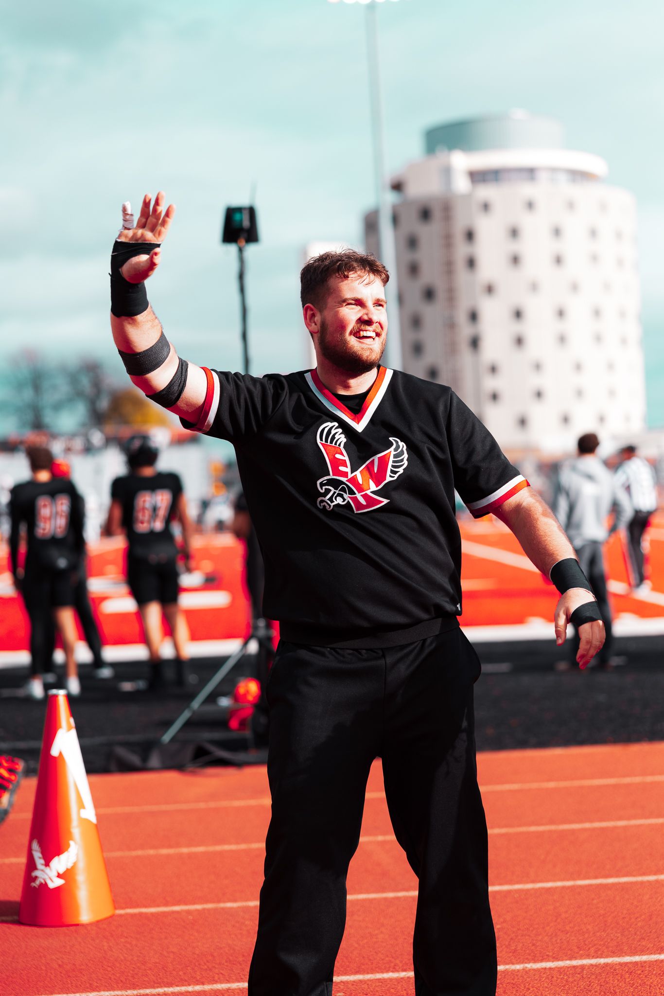Sequence of photos showing an athlete in black uniform celebrating and expressing joy during a sports event.