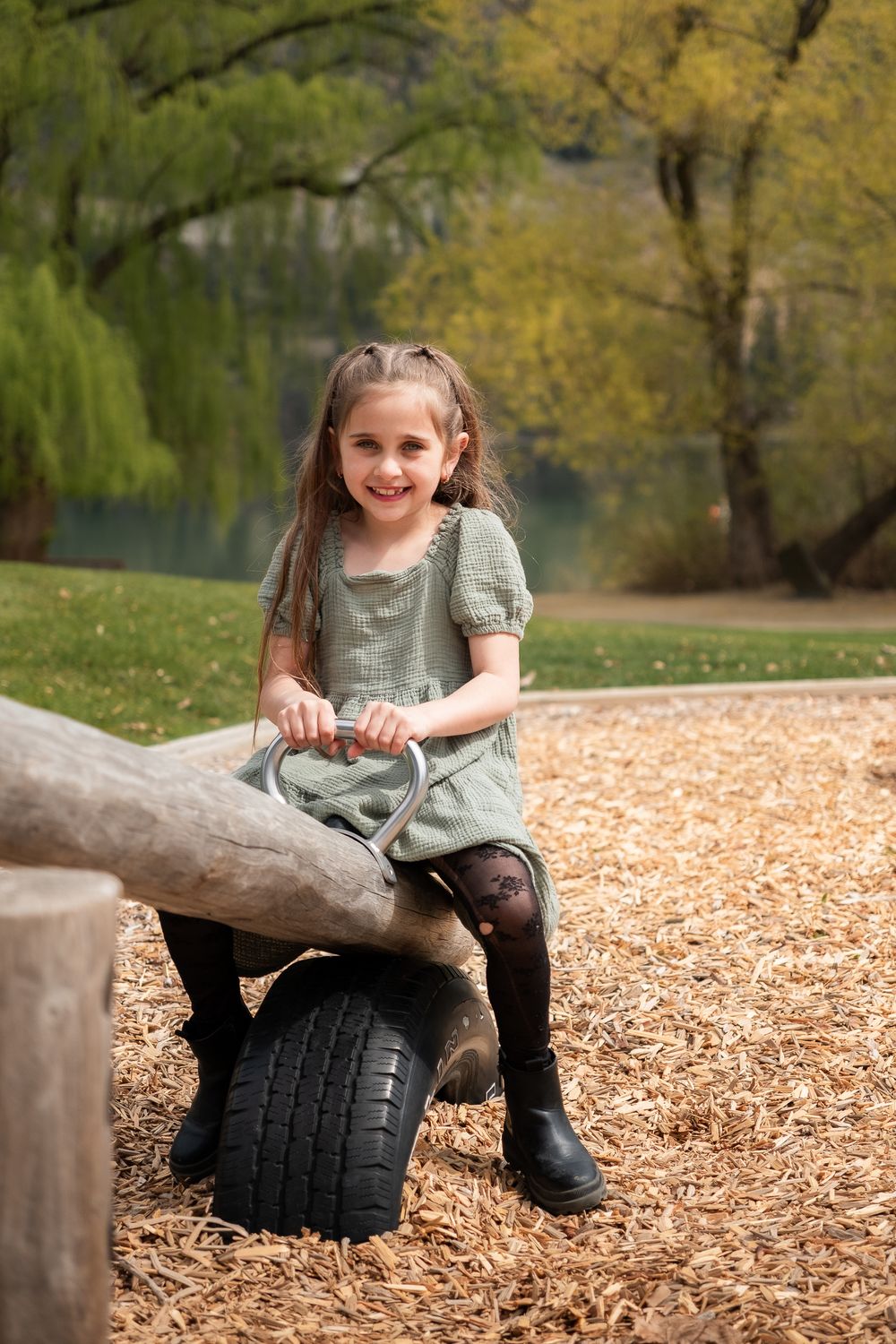 child on playground, sunny day