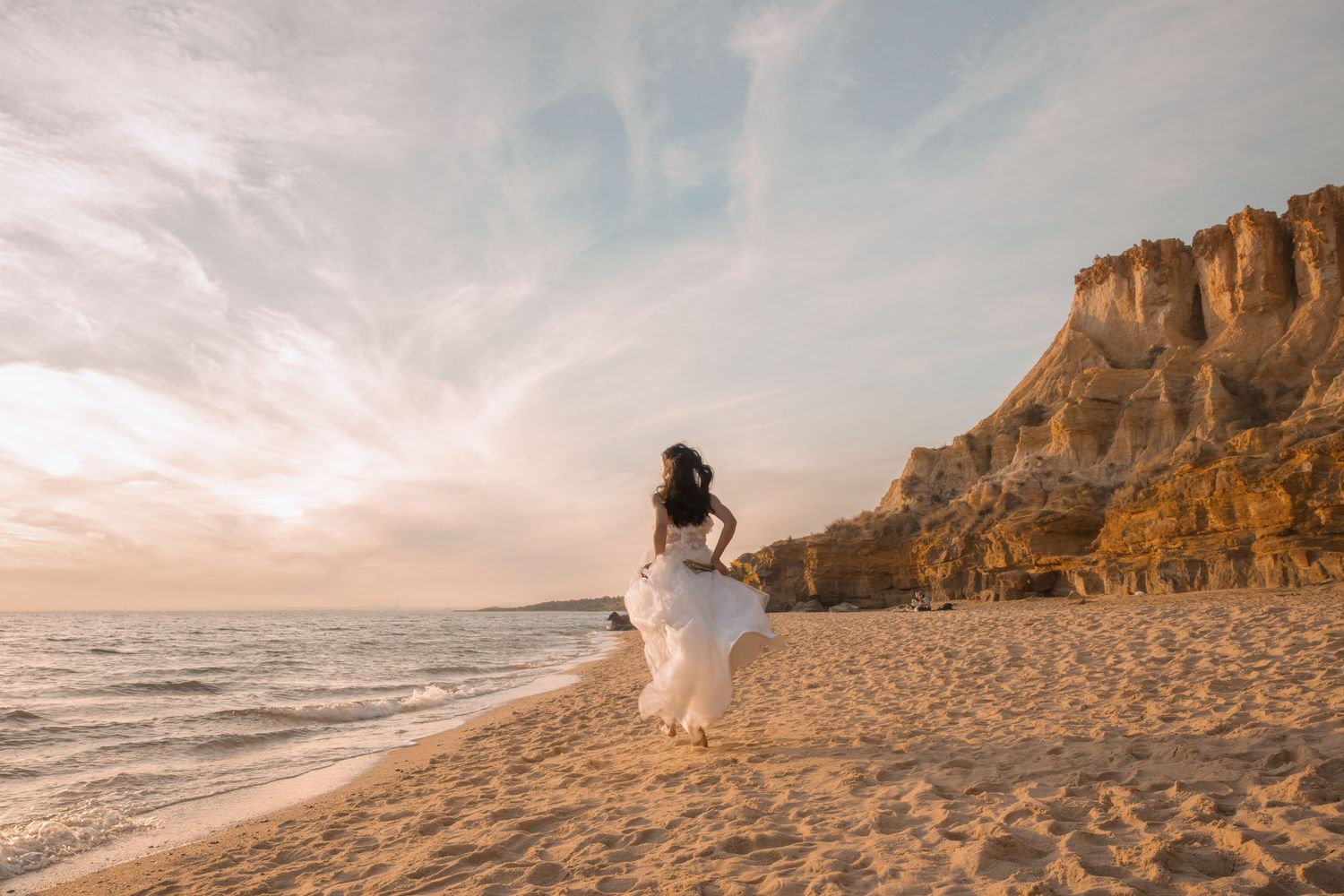 Cinematic engagement photography by the cliffs at Half Moon Bay