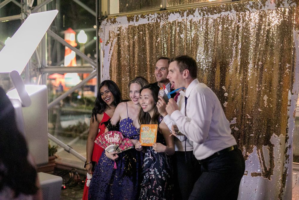 A collage of party scenes with people dancing and celebrating in front of a gold sequin backdrop.