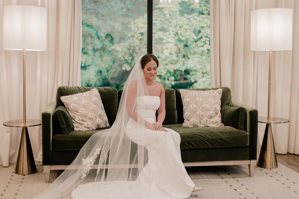 Interior wedding preparation room with elegant furnishings and natural lighting.