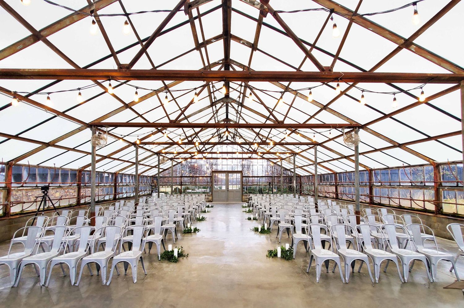 Oak Grove At Jorgensen Farms indoor greenhouse ceremony