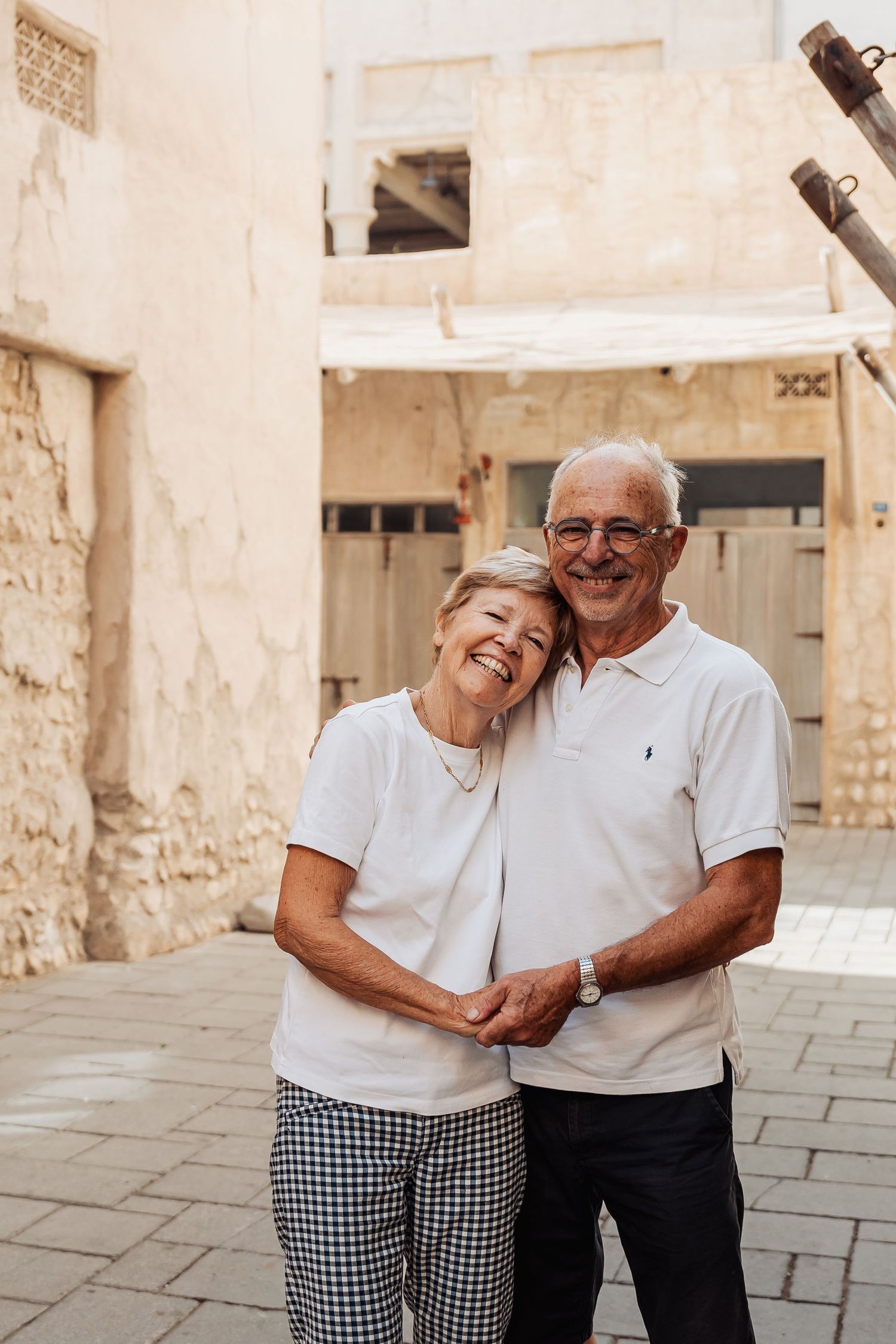 Senior couple embracing during outdoor family photoshoot in Al Seef Dubai