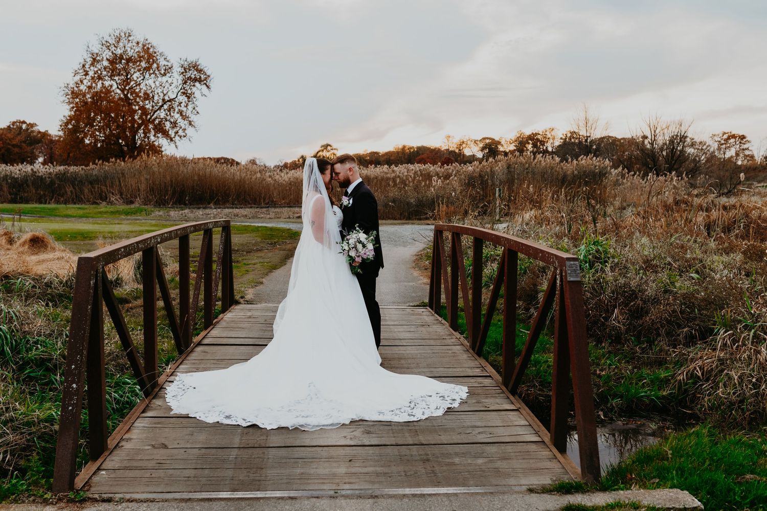 Central New Jersey wedding photographer capturing couple portraits at Galloping Hill Golf Course