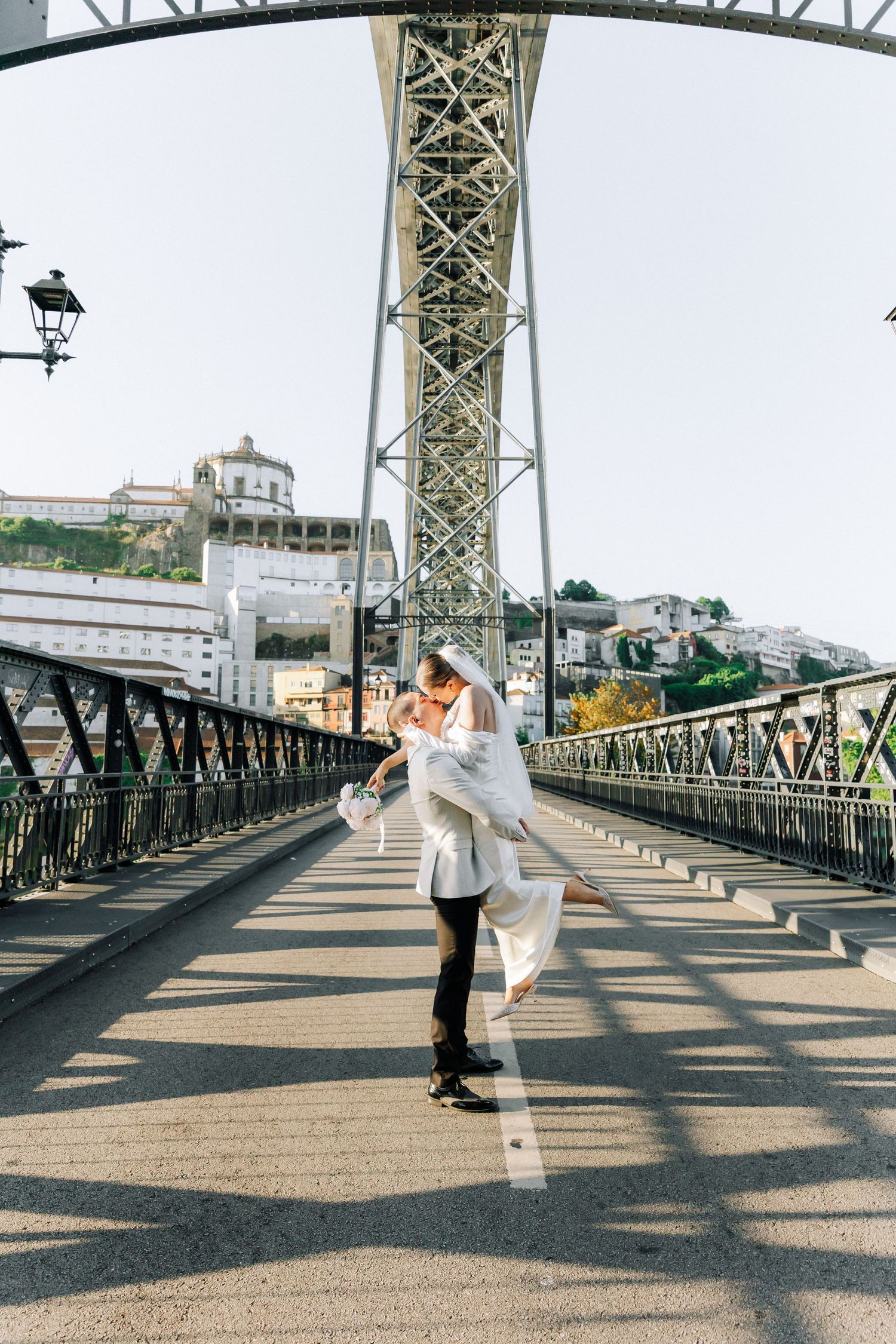 A collage of romantic wedding moments captured in both color and black-and-white photographs showing couples and floral bouquets.