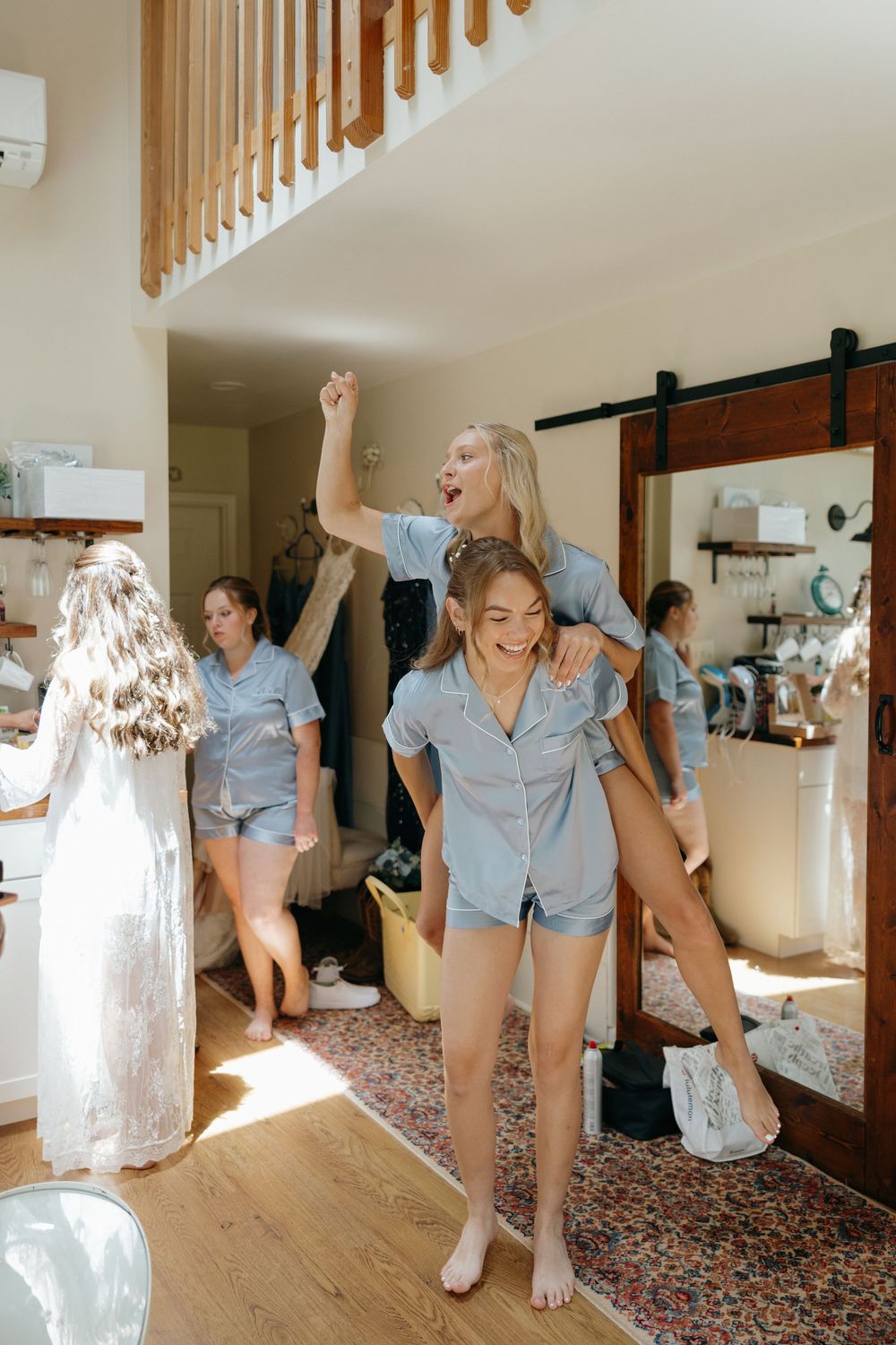 A series of playful action shots showing someone in a denim shirt and floral skirt jumping and dancing in a sunlit room.