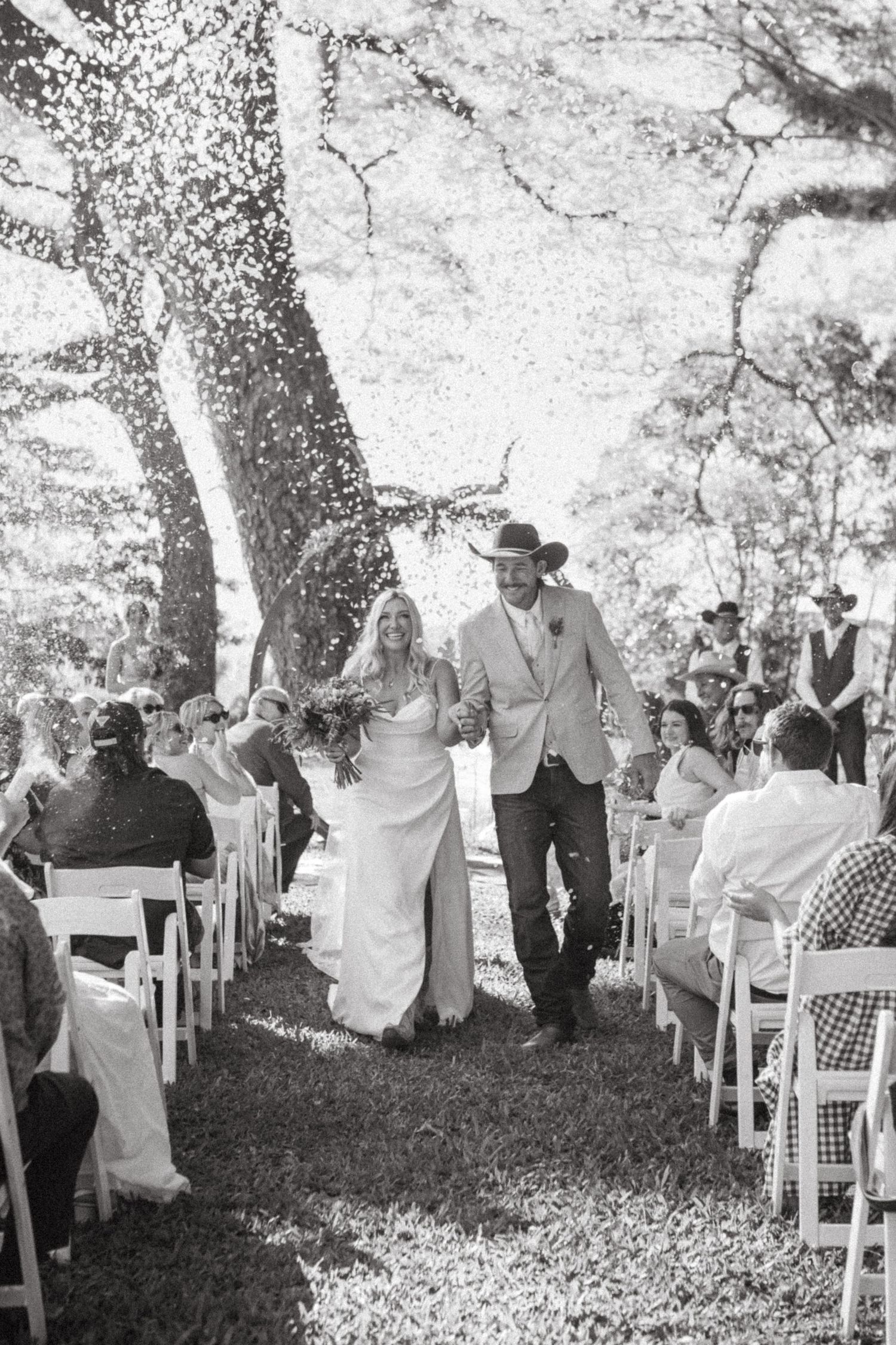 Bride and Groom walking down aisle at country Port Douglas Wedding