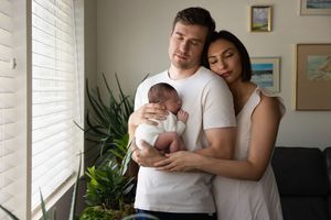 Lifestyle newborn photography session inside a Salt Lake City home