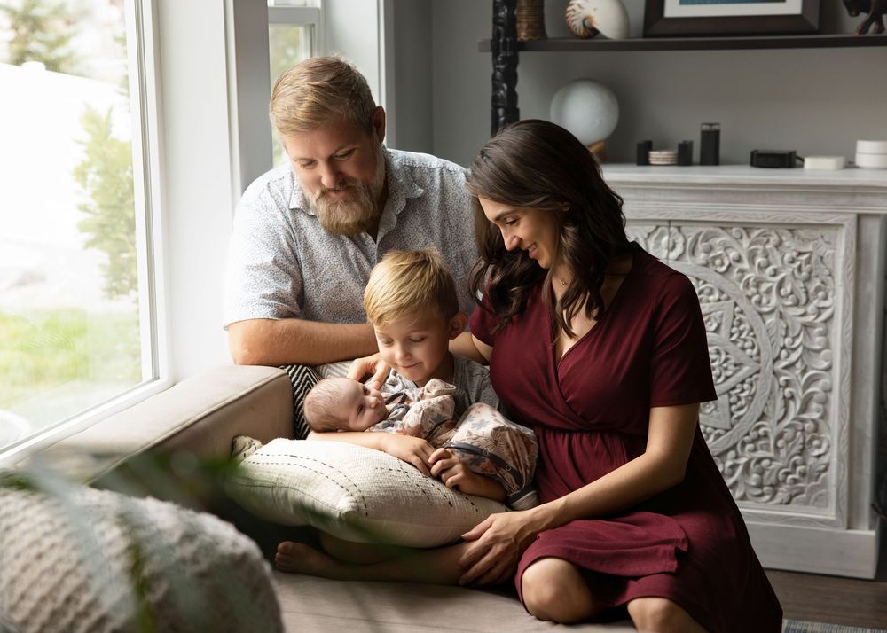 In-home newborn photography in Salt Lake City with relaxed, natural moments
