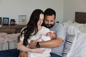 Salt Lake City in-home newborn session with family connection and cuddles