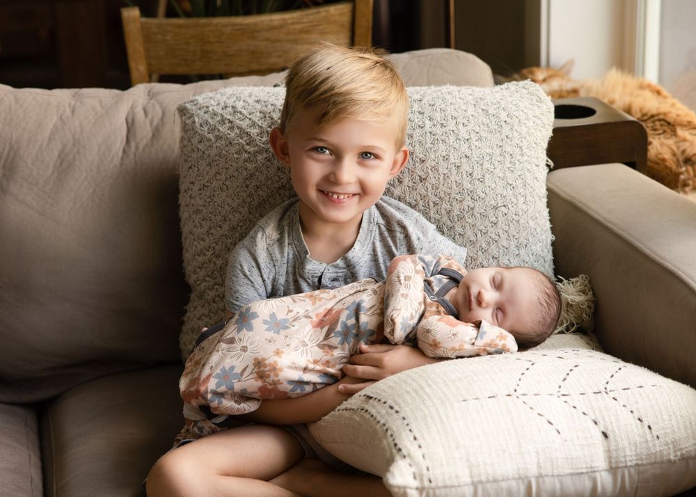 In-home newborn photography in Salt Lake City with relaxed, natural moments
