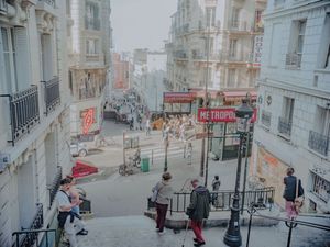 Outside a metro in the 18th arrondissement, Montmartre, Paris, France. 2024