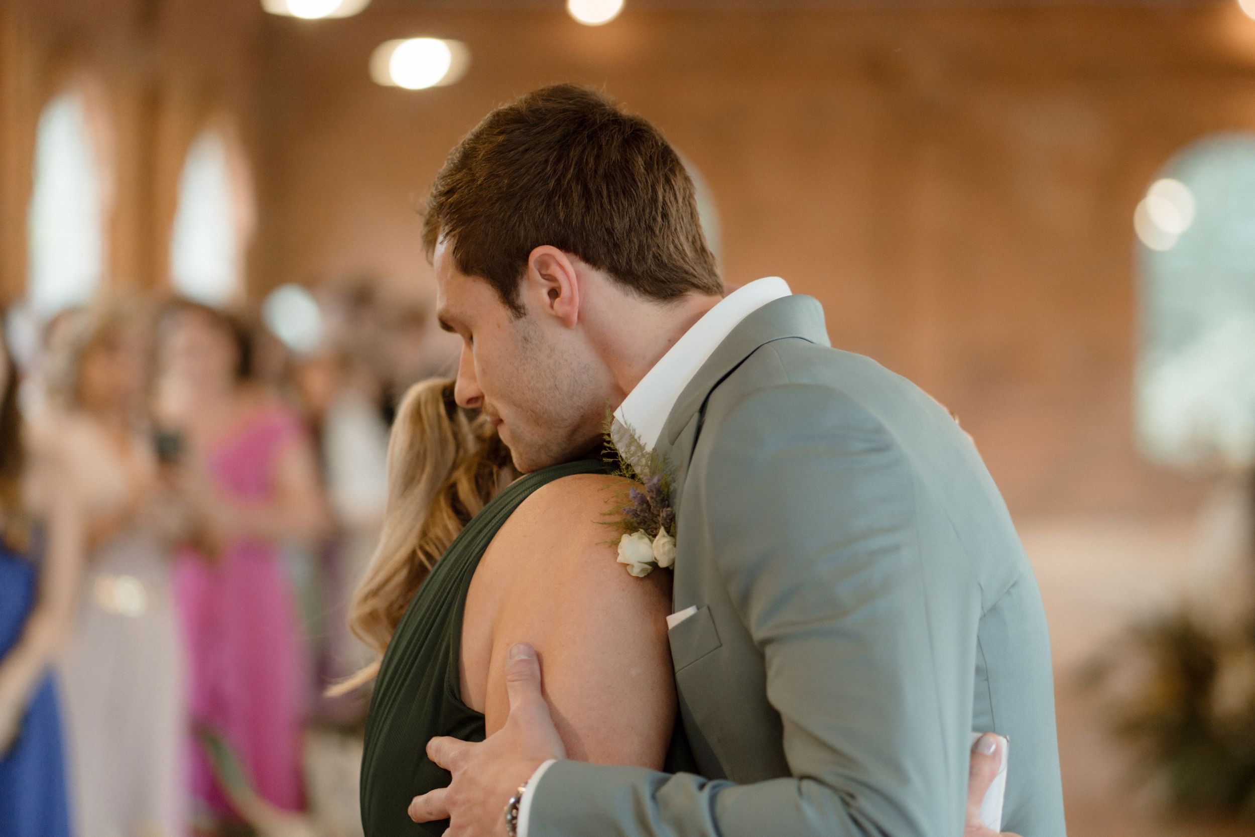 Intimate moment on the dance floor during wedding reception.